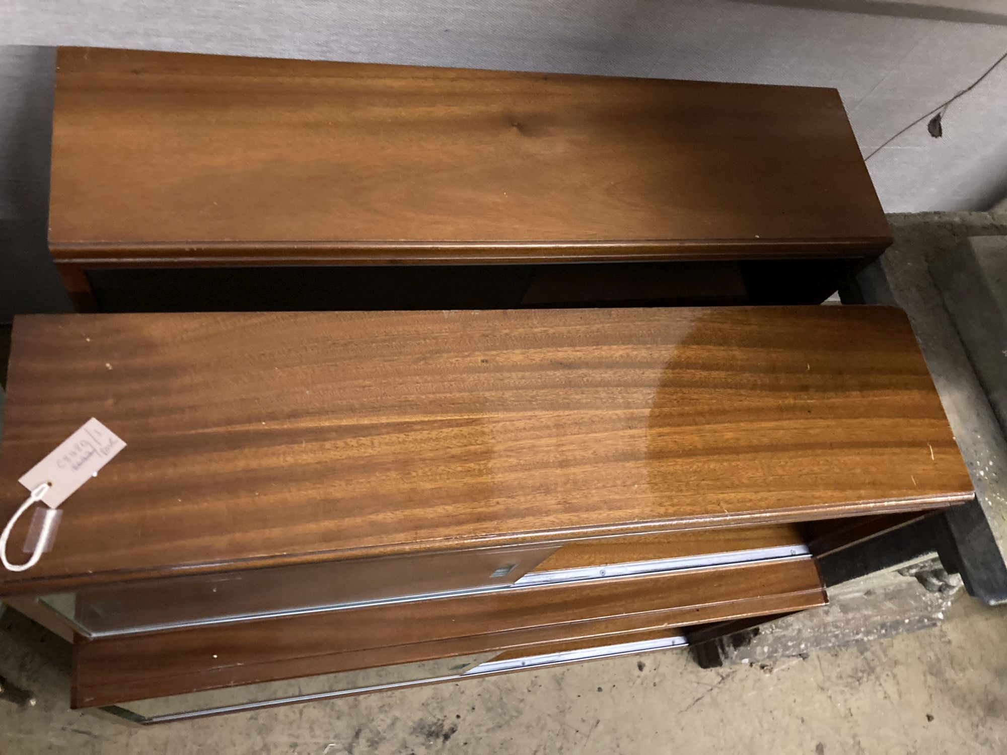 A pair of Minty style teak two section bookcases, width 89cm depth 29cm height 76cm